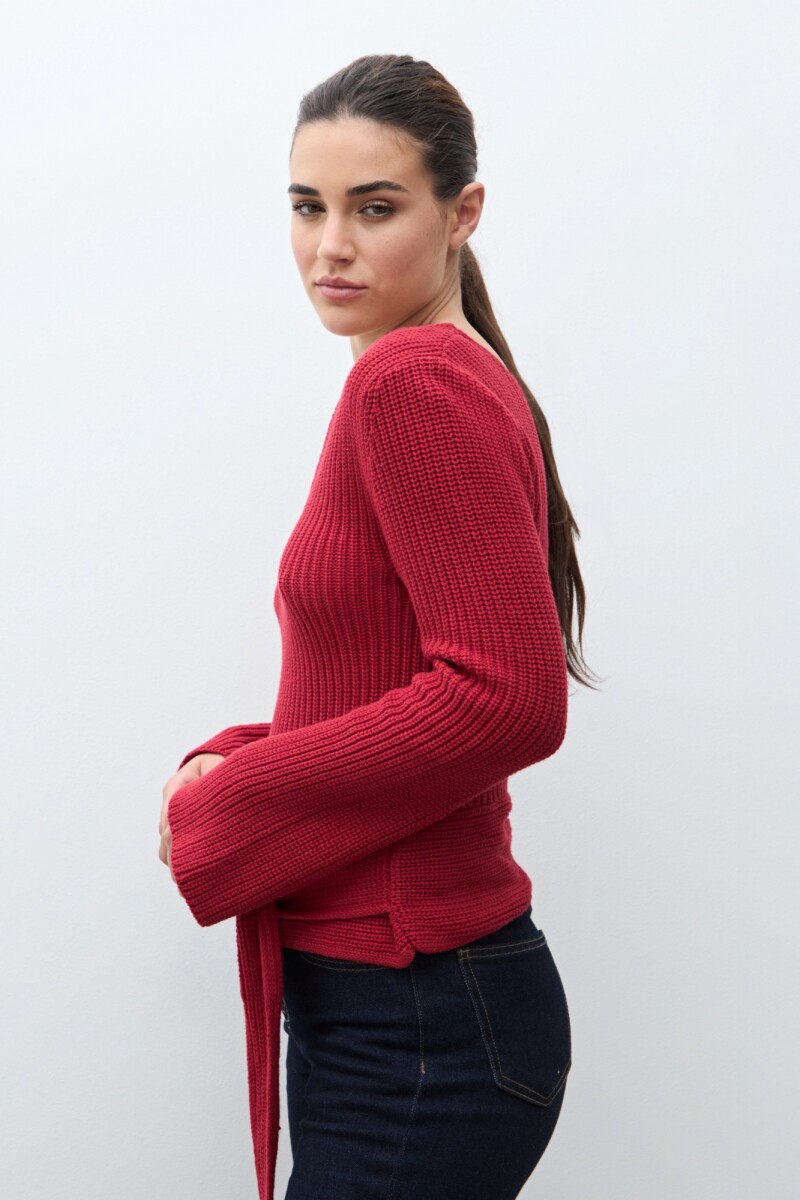 Sweater con lazo rojo