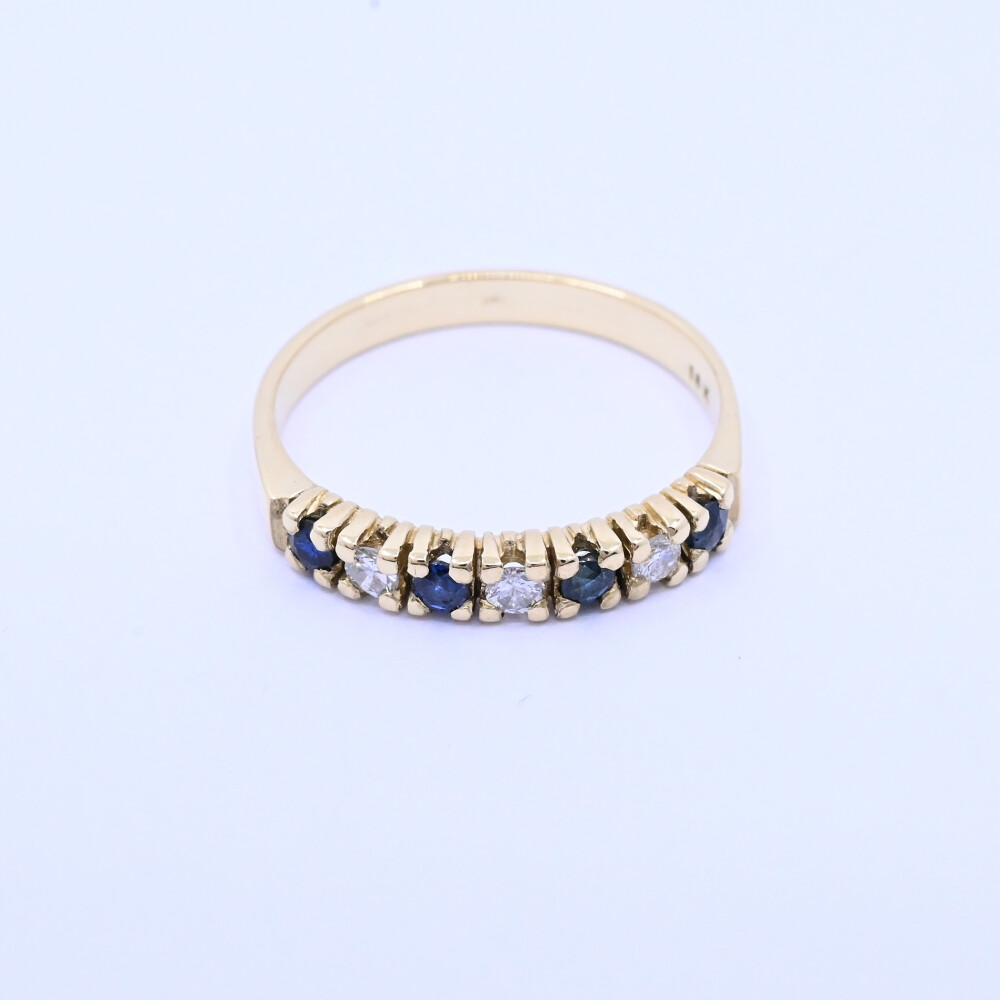 Anillo medio sin fin oro 18k amarillo con zafiros y brillantes. Anillo medio sin fin oro 18k amarillo con zafiros y brillantes.