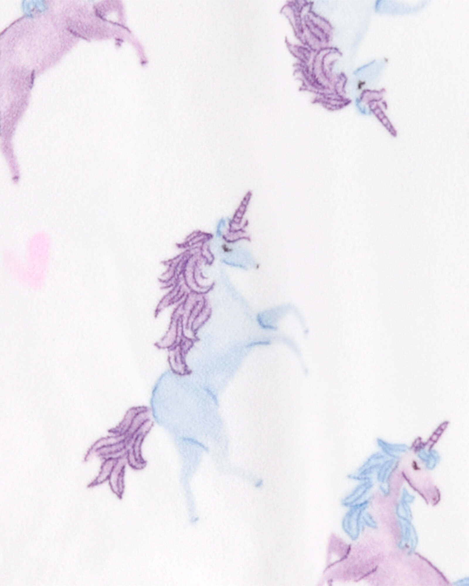 Pijama uno pieza de micropolar, con pie, blanco, diseño unicornios. Talles 6-8 Pijama uno pieza de micropolar, con pie, blanco, diseño unicornios. Talles 6-8