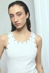 Musculosa con ojalillos blanco