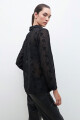 Camisa plumetti bordado floral negro