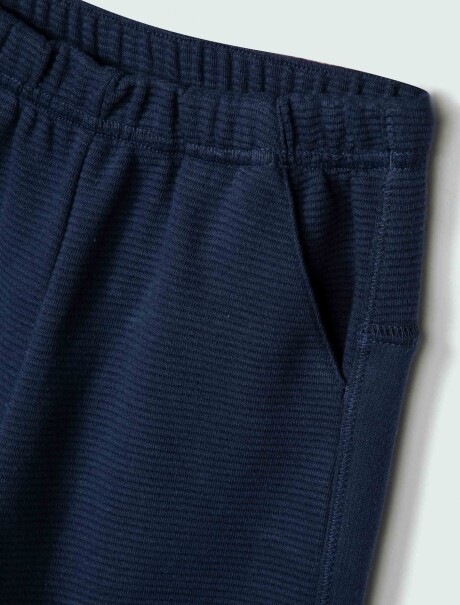 PANTALÓN BABUCHA INFANTIL EN TELA ACANALADA AZUL