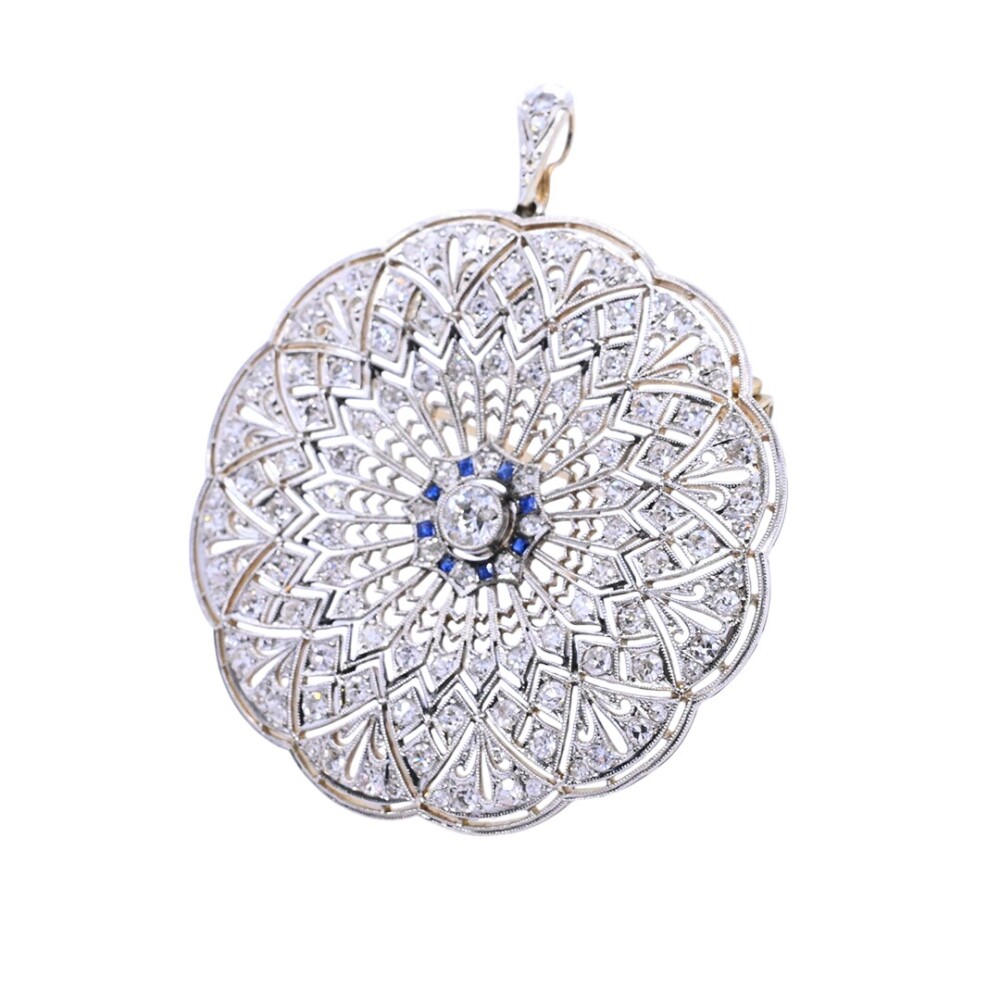 Colgante y prendedor antiguo en oro 18 k, brillantes y zafiros sintéticos. Colgante y prendedor antiguo en oro 18 k, brillantes y zafiros sintéticos.