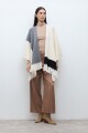 Ruana color block con flecos crudo