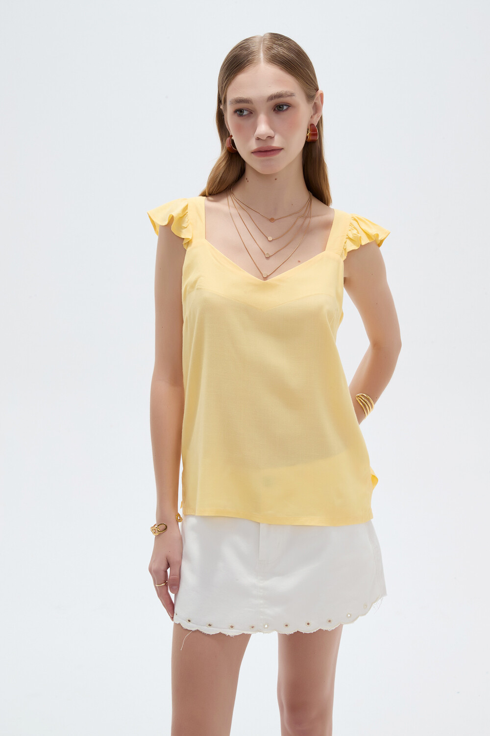 Musculosa Nuvio Amarillo