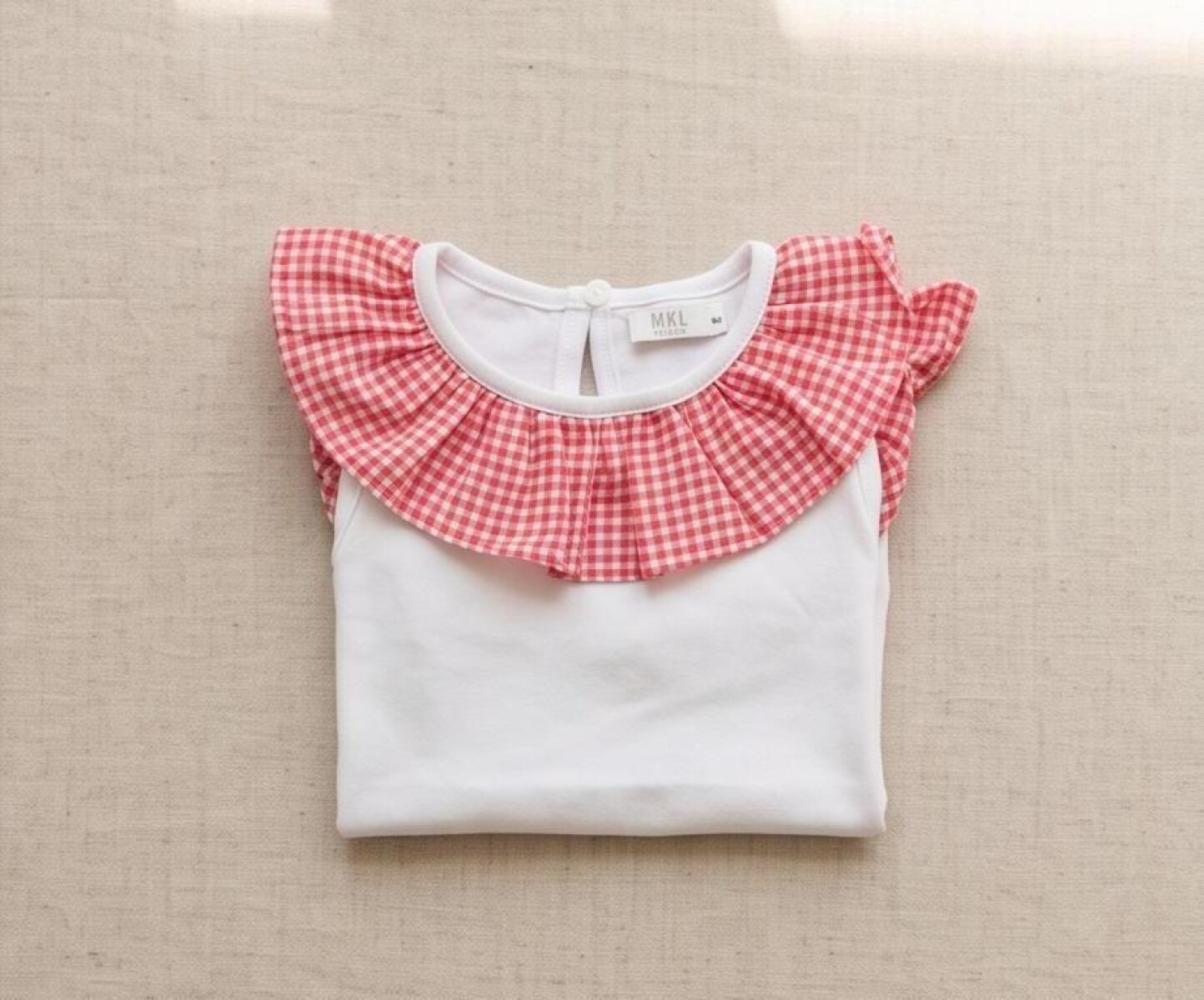 REMERA NENA 