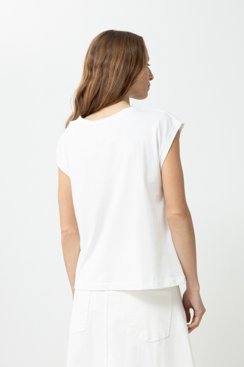 Blusa frente bordado crudo