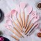 JUEGO 11 PIEZAS MENAGE SILICONA MANGO MADERA ROSA