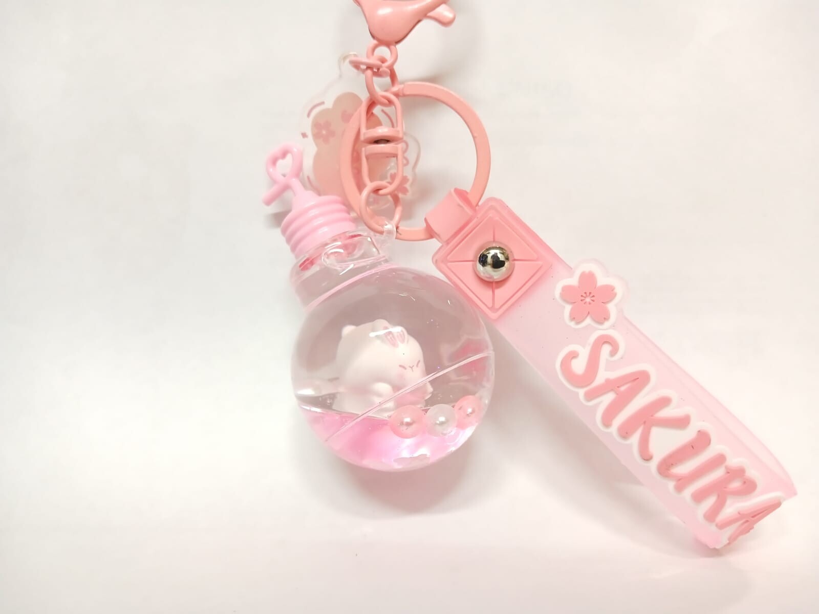Llavero Sakura conejito - lamparita 