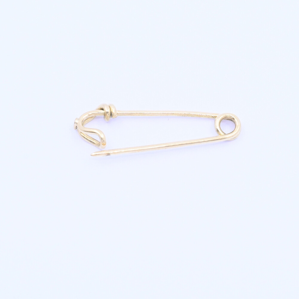 Alfiler en oro 18k. Alfiler en oro 18k.