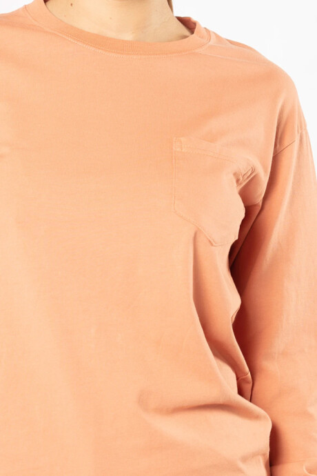 REMERA MANGA LARGA TROTA Naranja