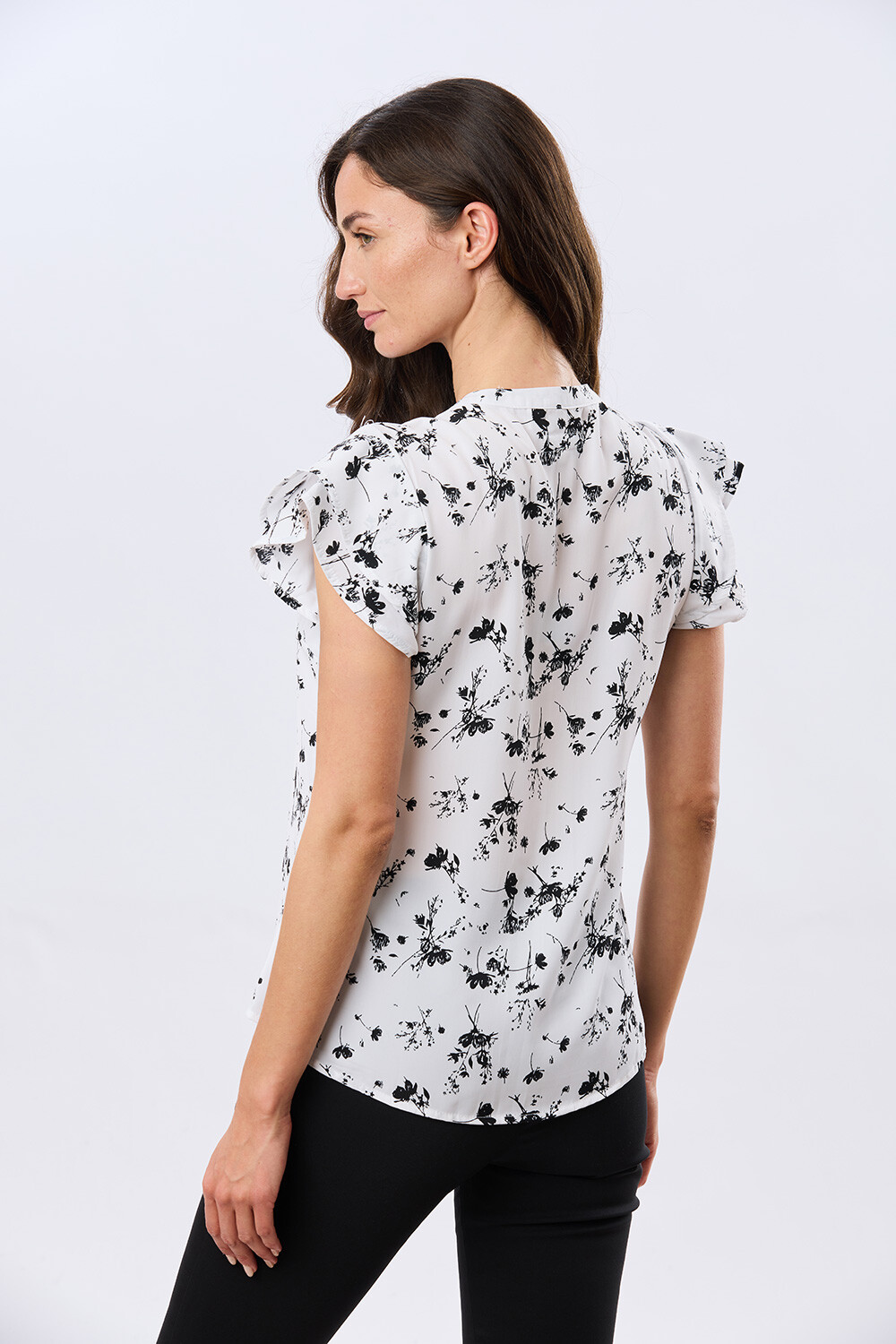 BLUSA CON VOLADOS Flor