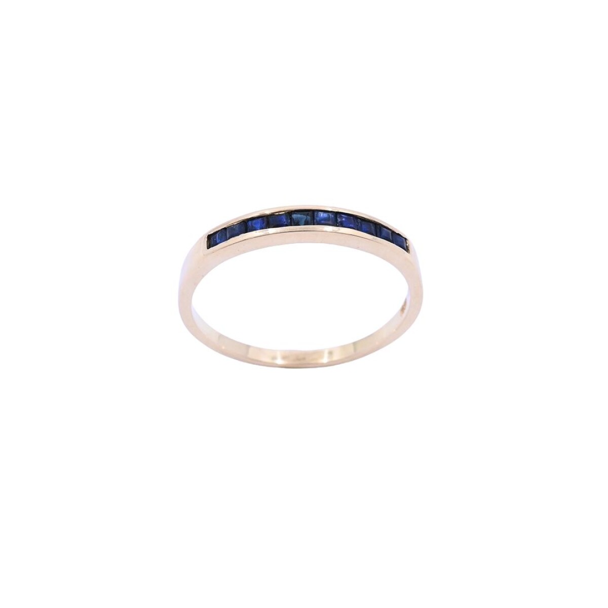 Anillo medio sin fin oro 18 k zafiros azules carré. 