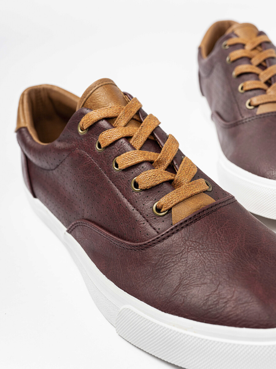 Champion perforado - tostado 