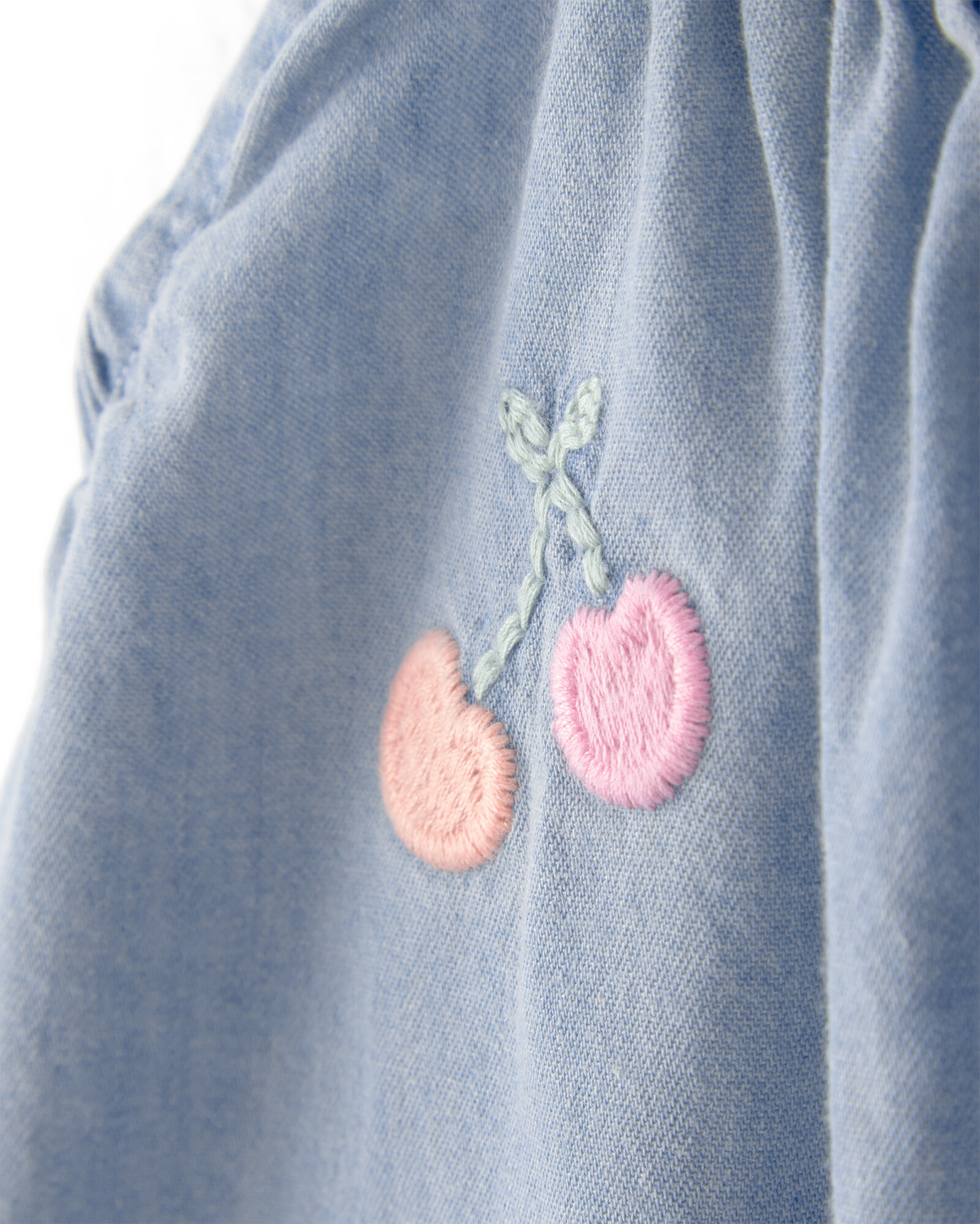 Monito de chambray con bordado Monito de chambray con bordado