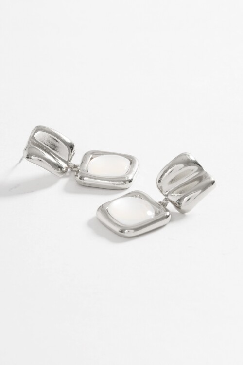 Caravanas metálicas dije nacarado plateado