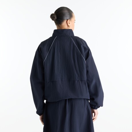 Campera New Balance de Dama - Sport Legacy - WJ6113KSDNT NAVY BLUE