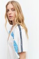 Túnica oversized con detalles bordados blanco