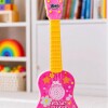 Guitarra con micrófono, luces y melodías Rosa