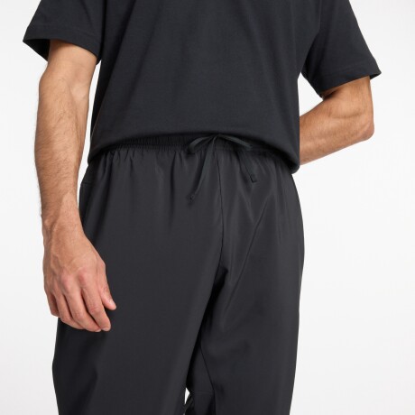 Pantalón New Balance de Hombre - ACTIVE WOVEN - MP41011BK BLACK