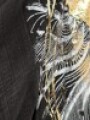 Blusa con nudo estampada con dorado Negro