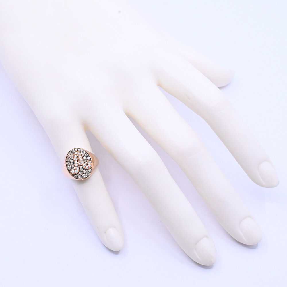 Anillo oro 18k rosa con letra A y brillantes. Anillo oro 18k rosa con letra A y brillantes.