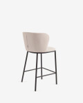 Taburete Ciselia de chenilla beige y patas de acero con acabado negro altura 65 cm