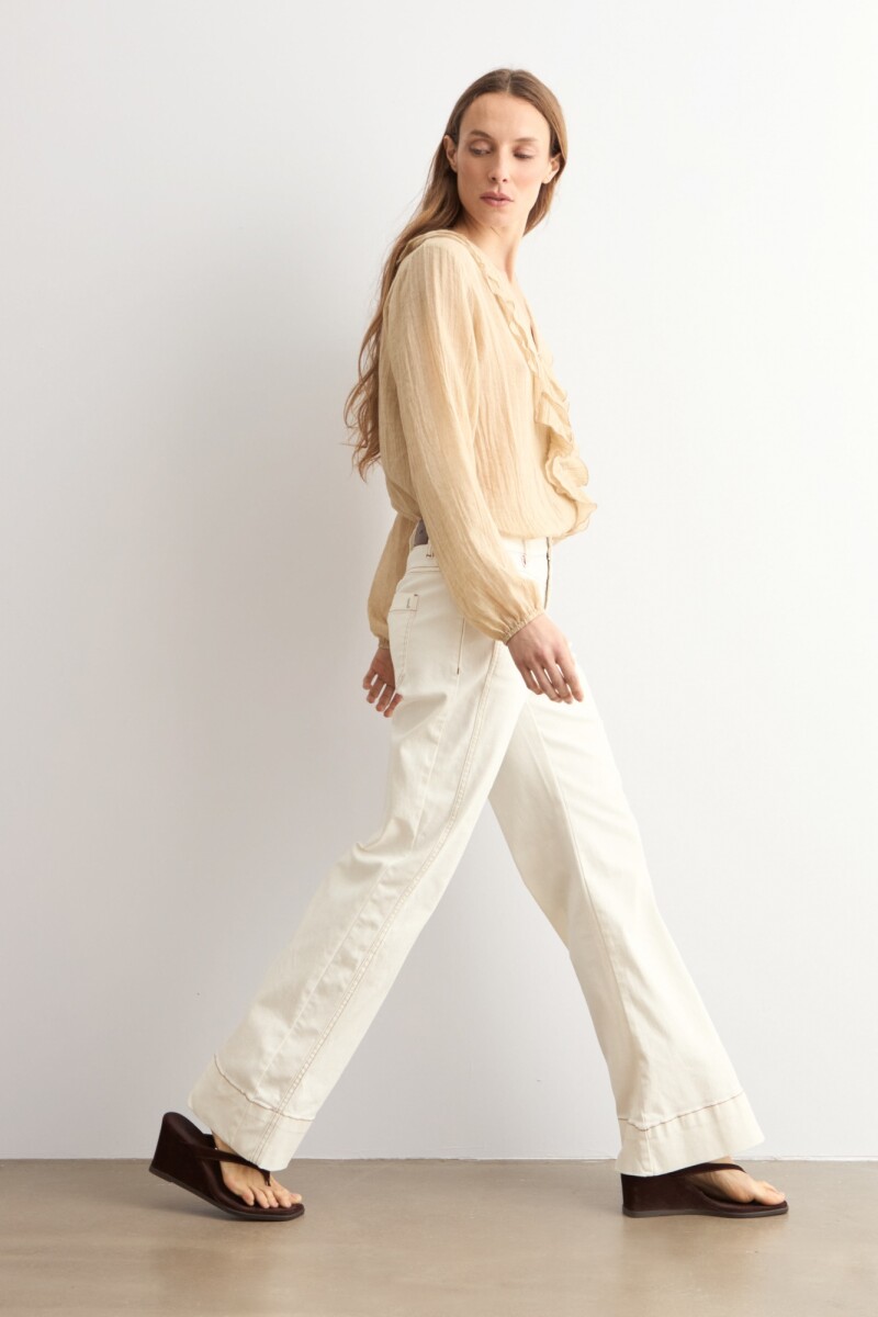 Blusa con volados beige