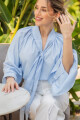 BLUSA C646/25 ESCOTE V M/L CON VOLADOS Y LAZO EN CUELLO Celeste