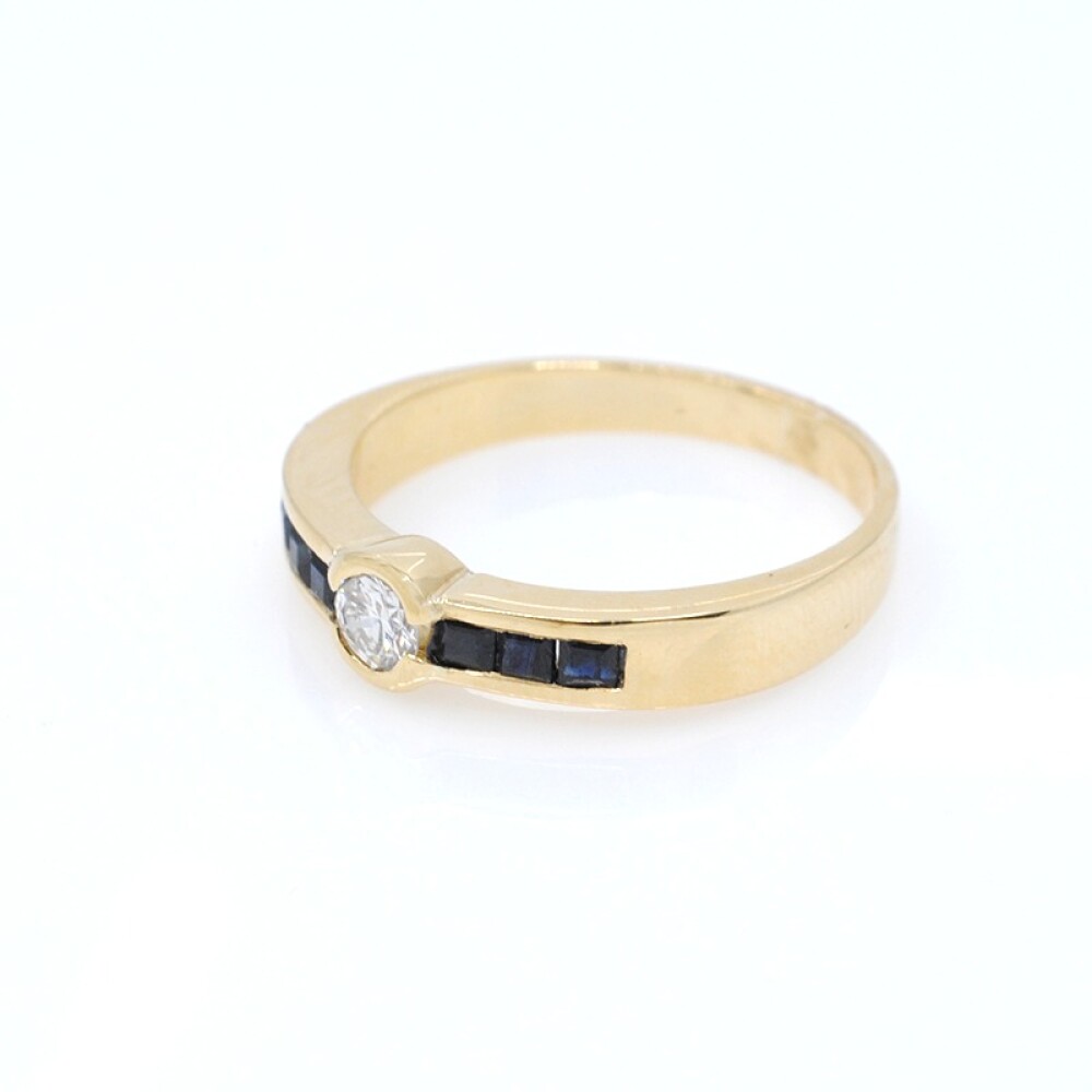 Anillo oro 18k y brillante y zafiros Anillo oro 18k y brillante y zafiros