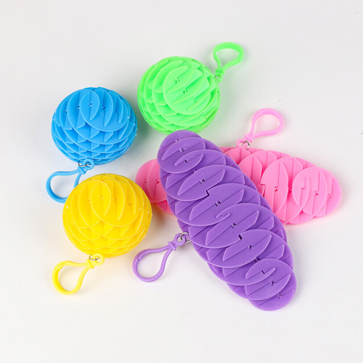 Llavero cuadriculado de plástico fidget toy - Fucsia 