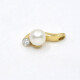 Dije en oro 18k con brillante y perla Dije en oro 18k con brillante y perla