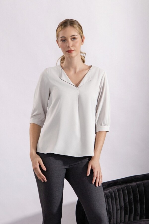 Blusa con Solapa. Blusa con Solapa.