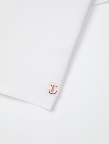 CAMISETA INFANTIL CON BOTONES BLANCO