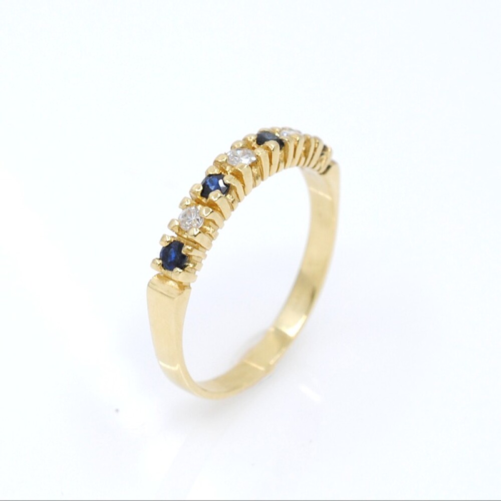 Anillo en oro 18k , brillantes y zafiros Anillo en oro 18k , brillantes y zafiros