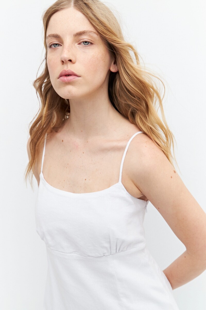 Vestido corto de lino con volado blanco