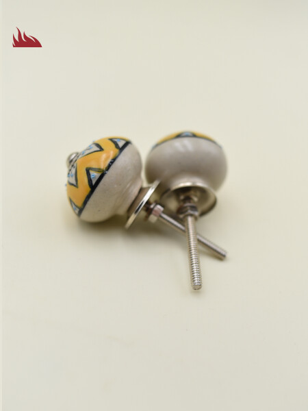 TIRADOR CERAMICA AMARILLO 6CM X2 AMARILLO