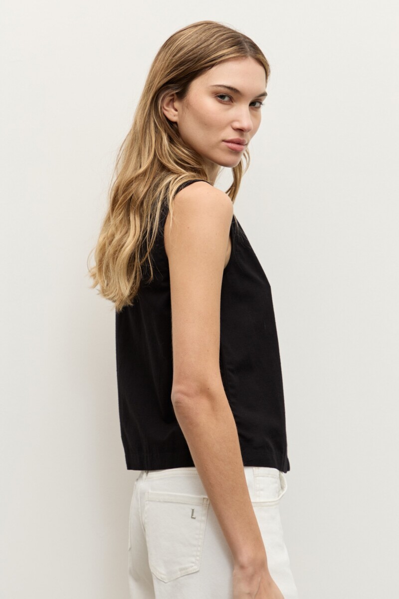 Blusa con aplique bordado negro