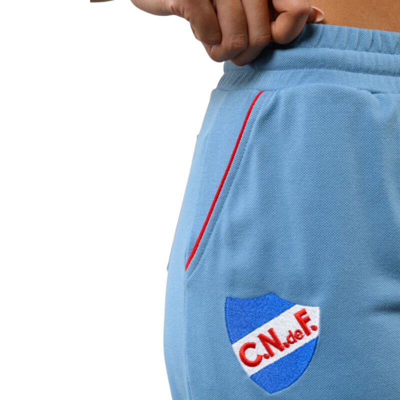 Pantalón Umbro AURA Mujer NU340352 Celeste-blanco