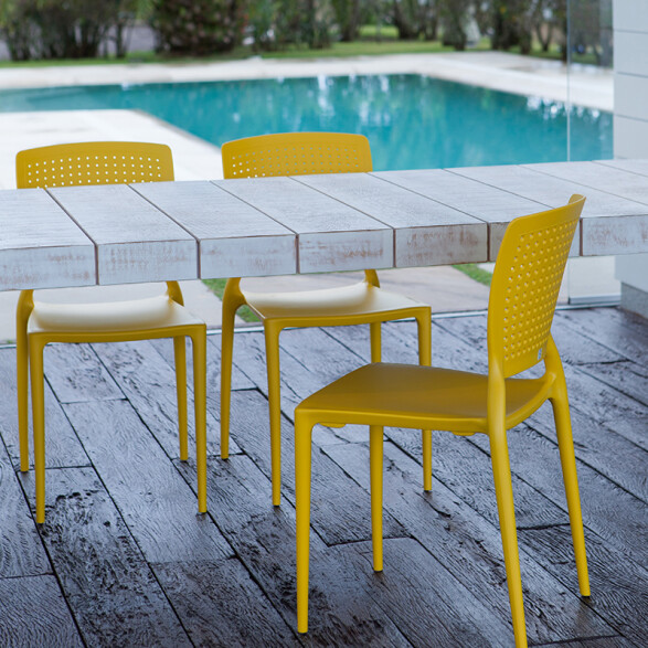 Silla apilable amarilla SAFIRA con respaldo calado TD0580