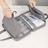 Neceser de viaje organizador con divisiones gris