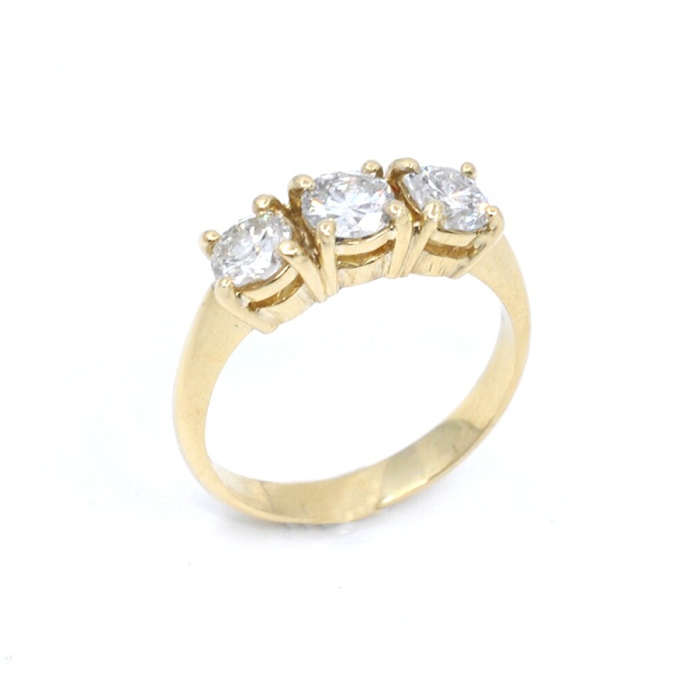 Anillo en oro 18k amarillo y 3 brillantes Anillo en oro 18k amarillo y 3 brillantes