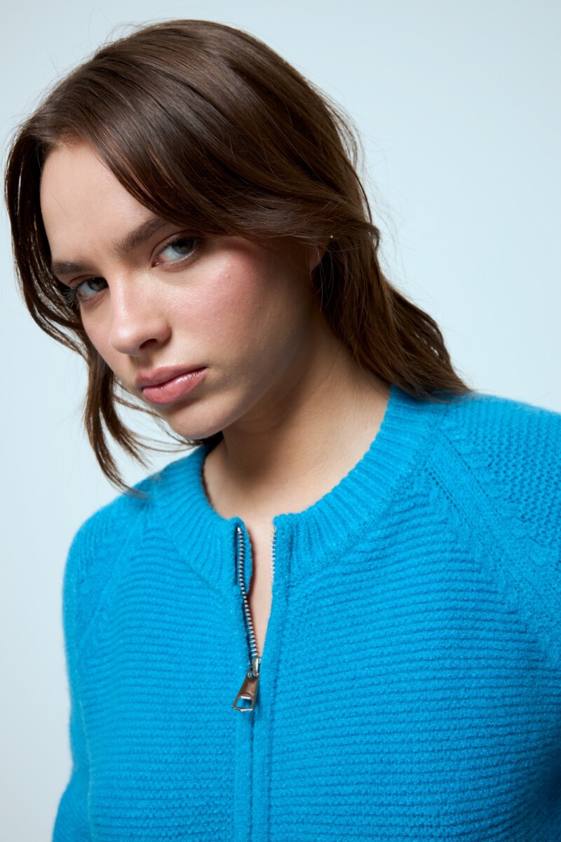Cardigan corto con cierre celeste