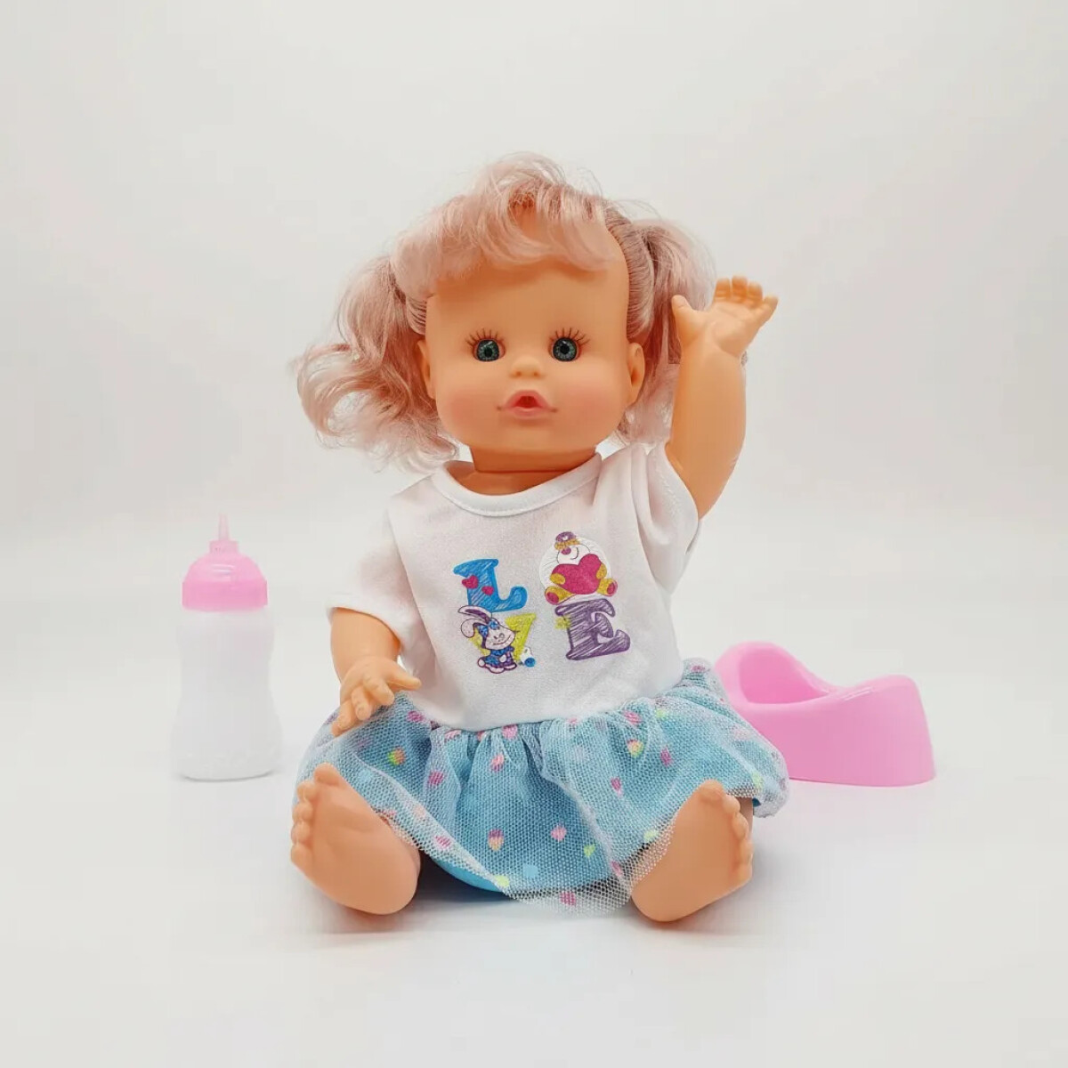 Bebota que hace pis con pelela y accesorios 