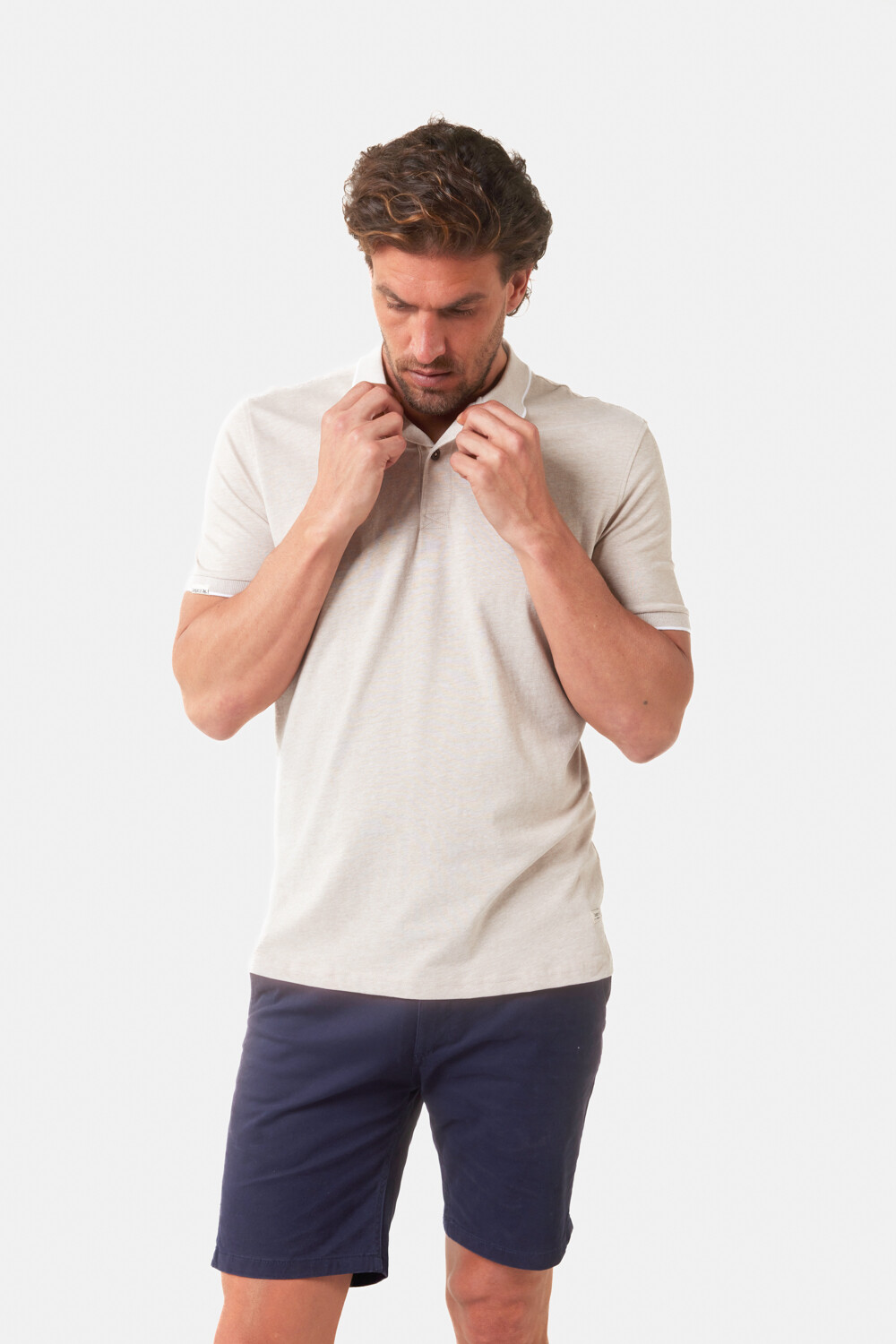 REMERA POLO JERSEY RAYADA Beige