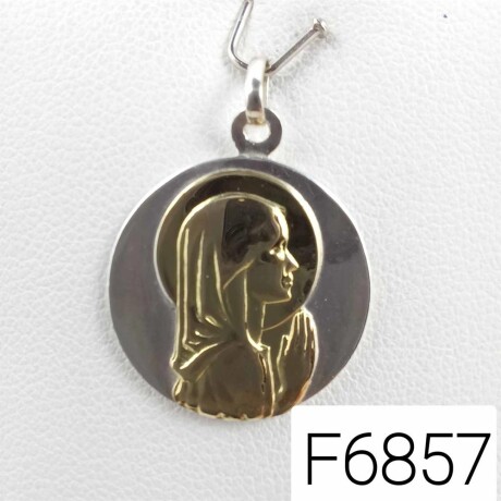 Medalla de plata 925 con Virgen Niña en double de oro 18k. Medalla de plata 925 con Virgen Niña en double de oro 18k.