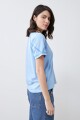 Remera escote en V con vainillas celeste melange