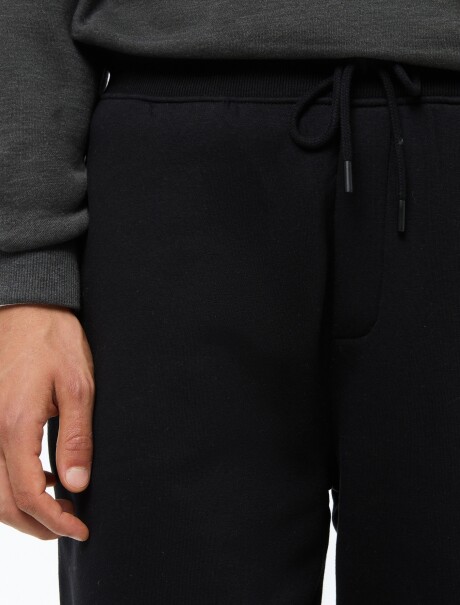 PANTALÓN BABUCHA MASCULINO CON FELPA NEGRO