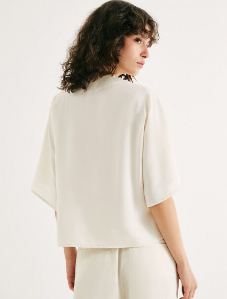 BLUSA DE CUELLO EN V BLANCO