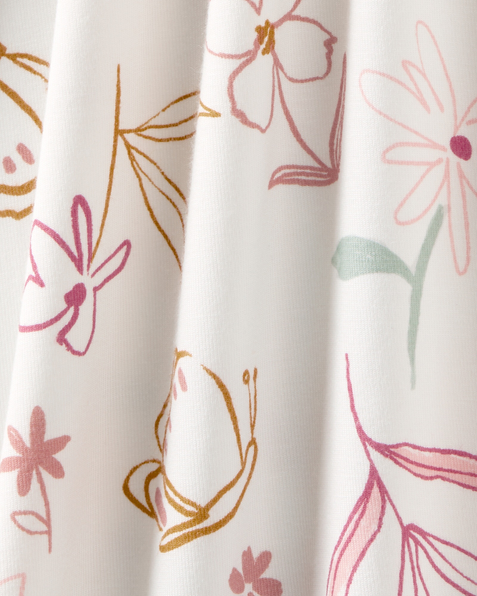 Pijama uno pieza de viscosa Ecovero, con pie, diseño floral, línea Purelysoft. Talles PRE-9M Pijama uno pieza de viscosa Ecovero, con pie, diseño floral, línea Purelysoft. Talles PRE-9M